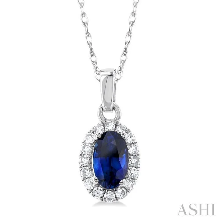 1/20 ctw Round Cut Diamond and 5X3MM Oval Shape Sapphire Halo Precious Pendant with Chain in 10K White Gold