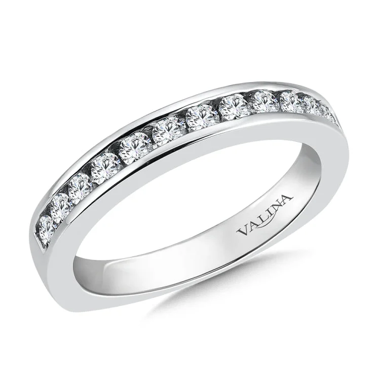 True fit matching diamond wedding band and a beautiful reminder of that special day for years to come.